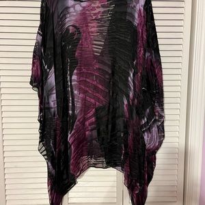 Light weight flowy chiffon kimono cardigan style. One button opening.